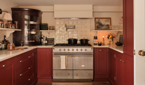 How can looking behind large appliances once in a while reveal dust build-up or hidden issues?