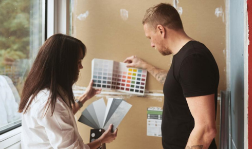How can painting inside open shelves a contrasting colour highlight decor pieces placed on them